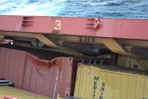 Containers can be seen pushing up the hatch covers in the bow section - photo credit LOC