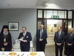 The Chairman of GSCC Harry J. Fafalios delivers his message with Archbishop Gregorius on the left and Captain (Rt.HCG) Costas Amarantidis, H.E. The Greek Ambassador Constantinos Bikas and Emeritus Secretary-General of the IMO Adm (Rt.HCG) Efthimios Mitropoulos