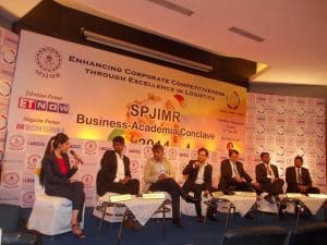Speaker panel at SP Jain Institute meeting
