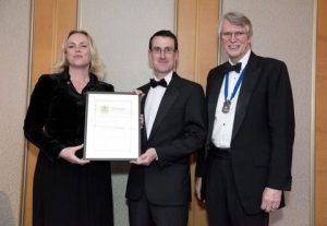 QinetiQ RINA Award: Kevin Reynolds Associate Technologist International Paint receives the Award from Sarah Kenny, Managing Director of QinetiQ Maritime and Peter French, President of the Royal Institution of Naval Architects