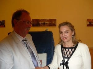 The winner of the Runcimn Award Prof. Roderick Beaton having just received the award from Ms Vassiliki Campbell CEO of the National Bank of Greece London Branch