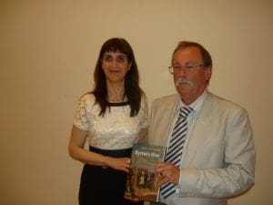 Dr. Angeliki Lymberopoulou with Prof. Roderick Beaton holding his winning book!