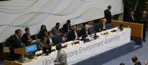 Mr. Naysan Sahba, Director of the Division of Communication and Public Information of UNEP, speaks at the start of the first-ever session of UNEA. Seated are (L-R): H.E. Ms. Sahle-Work Zewde, Director-General of the United Nations Office at Nairobi; Mr. Achim Steiner, UN Under-Secretary-General and Executive Director of the United Nations Environment Programme (UNEP); H.E. Ms. Professor Judi Wakhungu, Cabinet Secretary of the Environment, Water and Natural Resources of Kenya; H.E. Mr. Hassan Abdelgadir Hilal, Minister of Environment, Forestry and Physical Development of the Republic of Sudan, Outgoing President; UNEP staff and leadership. 