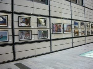 A view of the exhibited pictures at the east sector of the atrium