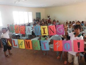 Children cheer project donors