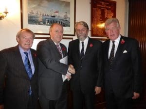Philip Hayden & Ian Millen from the Propeller Club presenting collection to Alan Watson, HMS Medusa & Commander Philip Ingham, Chief Executive of the Naval Club.