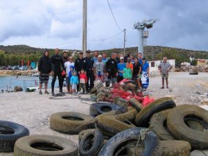 Volunteering divers and their “catch” from the underwater cleanup organized by the Central Port Authority of Chania at Marathi in Souda, Crete