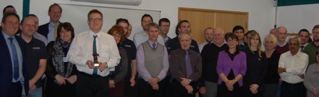 An overjoyed Servowatch Systems team with the “Statue of the Bronze Rescuer”