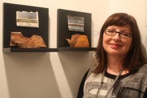 Linda Ingham with her works inspired by Lincolnshire seashore.