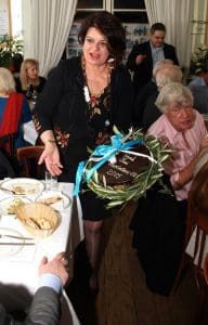 Martha-Maria Chrysomallis presenting the evening's GPA cake and Geoffrey Robertson QC