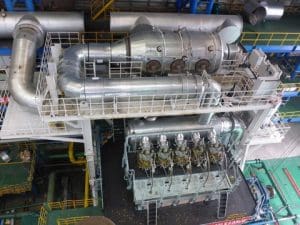 High-pressure SCR system jointly developed by Winterthur Gas & Diesel Ltd and Hudong Heavy Machinery Co Ltd. The cylindrical SCR reactor unit is located in the exhaust duct from the engine cylinders to the turbocharger turbine inlet.
