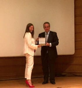 Danae Bezantakos receiving her award from Costas Michalos
