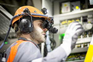 Wärtsilä’s service engineer utilising advanced augmented reality technology on board of a vessel.