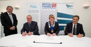Robert Goodwill MP, Minister of State for Shipping, Duncan Cunningham, Vice Chairman of The Society of Maritime Industries, Fiona Pankhurst, President of British Marine and Grahaeme Henderson, Vice President of The UK Chamber of Shipping signing the MOU at the Southampton Boat Show 2015.