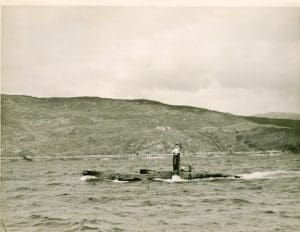X-craft under tow leaving Scotland in September 1943 for the 1, 000 mile journey to northern Norway. Copyright Paul Watkins.