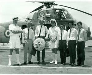 Capt Place, commanding officer of HMS Albion, welcomes visitors from Borneo, 1966. Copyright Paul Watkins.
