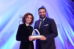Melina Travlos accepting the Dry Cargo Compny of the Year award from Panos Moraitis CEO of sponsor Aspida