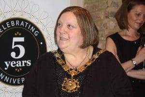 Mayor of Camden congratulates owners and staff of Namaaste Kitchen.