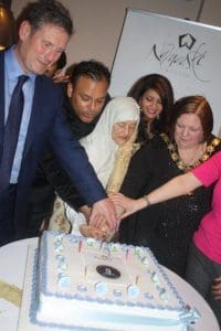 Sabbir's mother leads cake-cutting ceremony