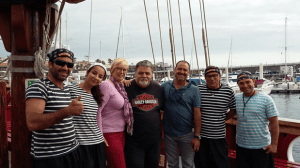 Capt. Antonio M. Padrón (center) with Jennifer Dubbelaar and Pablo A. Rodríguez, jointly with crew members of the FLIPPER UNO