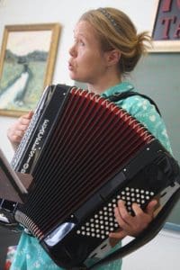 ... and on accordion, at her studio recital.